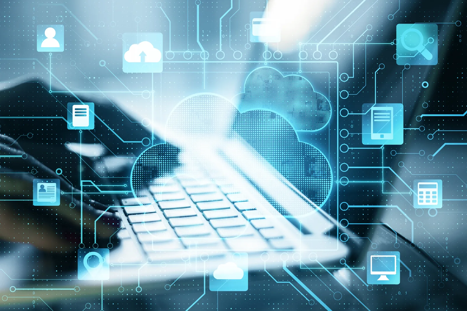 A laptop connected to cloud services and digital infrastructure